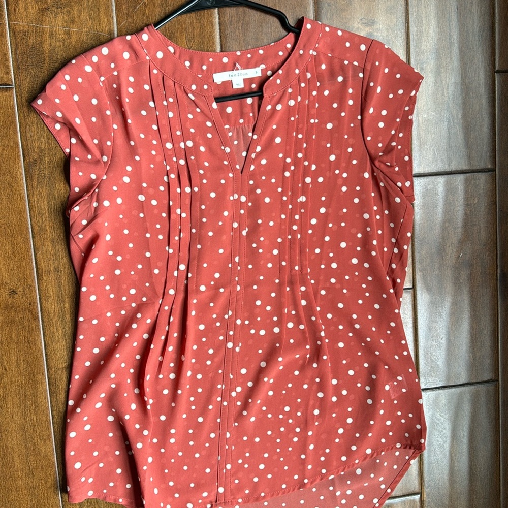 Rust color polka dot shirt